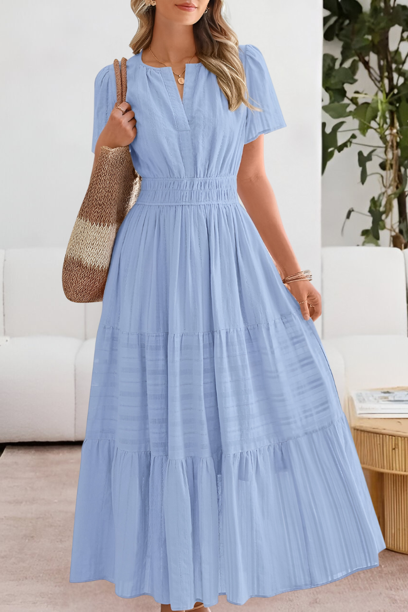 Lera – Maxikleid mit Smock-Details und Stufen - Blau