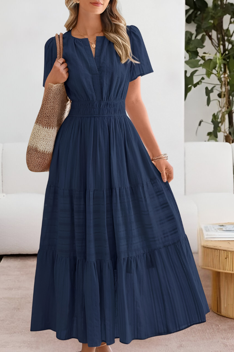 Lera – Maxikleid mit Smock-Details und Stufen - Marineblau