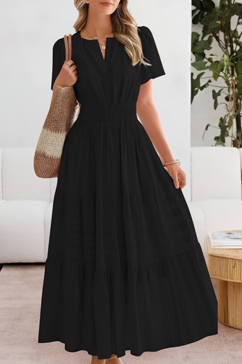 Lera – Maxikleid mit Smock-Details und Stufen - Schwarz