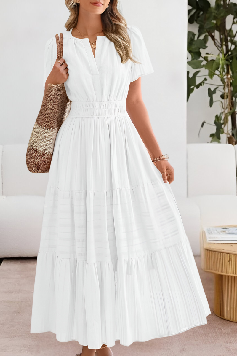 Lera – Maxikleid mit Smock-Details und Stufen - Weiß