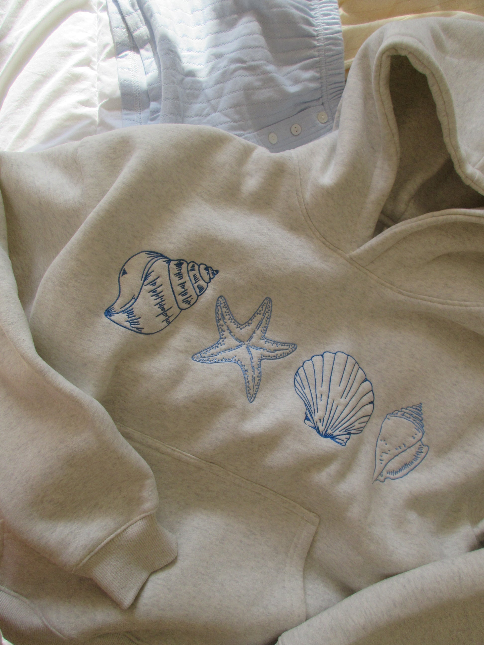 Ocenia - Unisex-Sweatshirt mit Muscheln