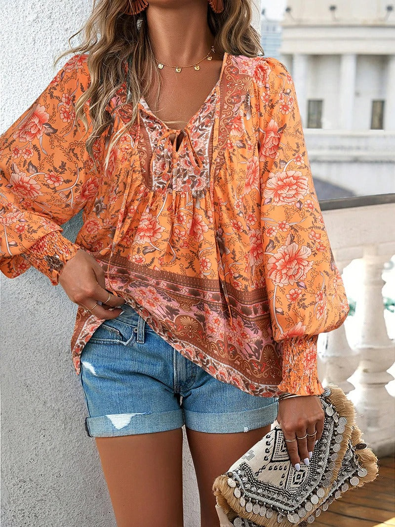 Viktoria - Damenbluse mit Blumenmuster und langen Puffärmeln Orange