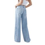 Yazmin - Weite Jeans mit Stickereien