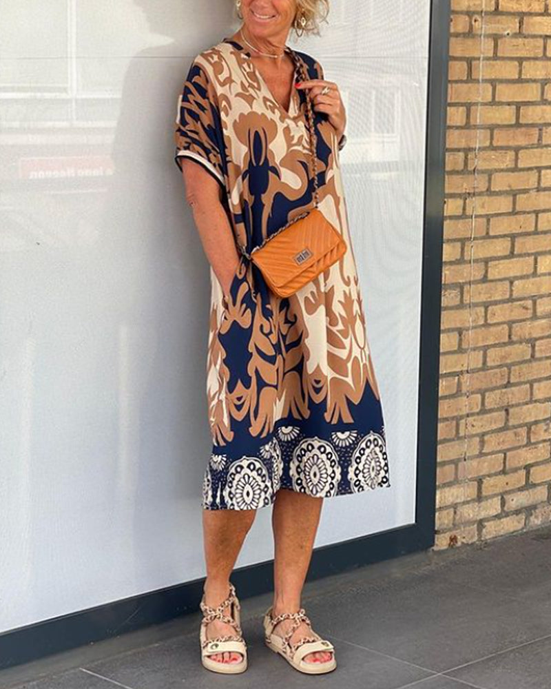 Angelika - Kleid mit geometrischem Print und V-Ausschnitt Blau