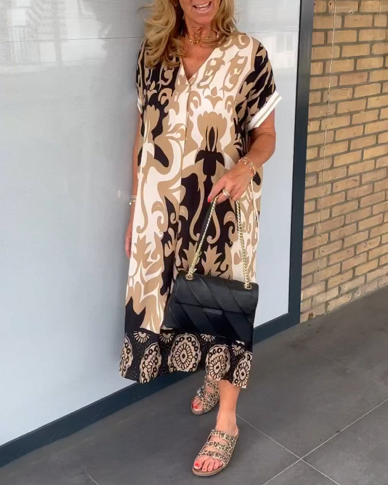 Angelika - Kleid mit geometrischem Print und V-Ausschnitt Braun