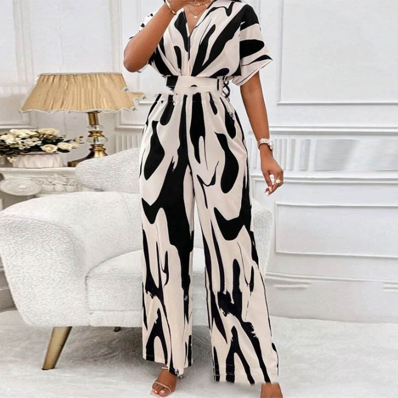 Femia – Bedruckter Damen-Jumpsuit mit V-Ausschnitt Schwarz und Weiß