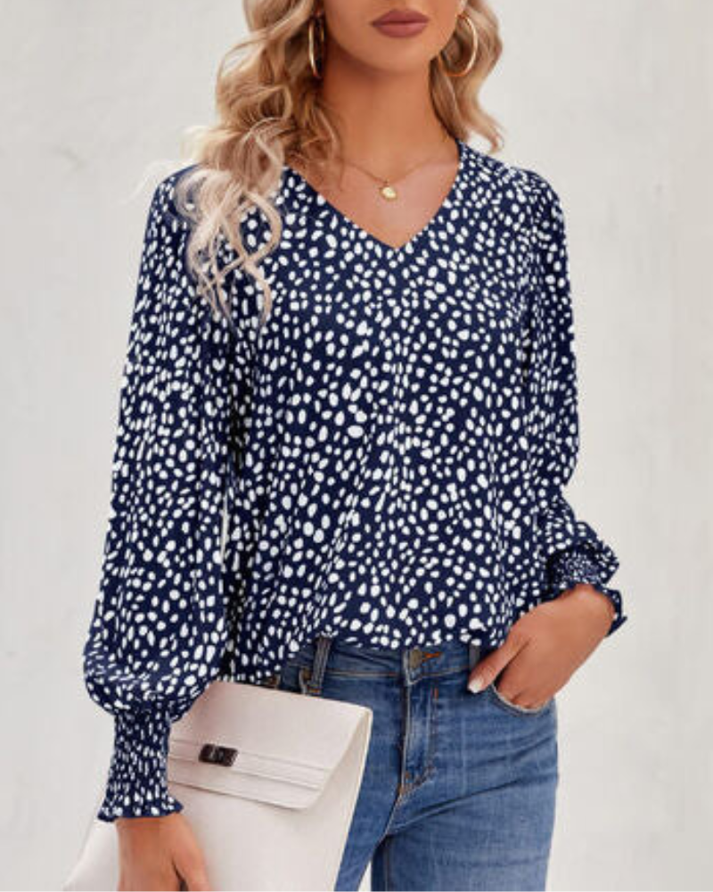 Radoslava-  Elegante gemusterte Bluse mit V-Ausschnitt und Puffärmeln Blau