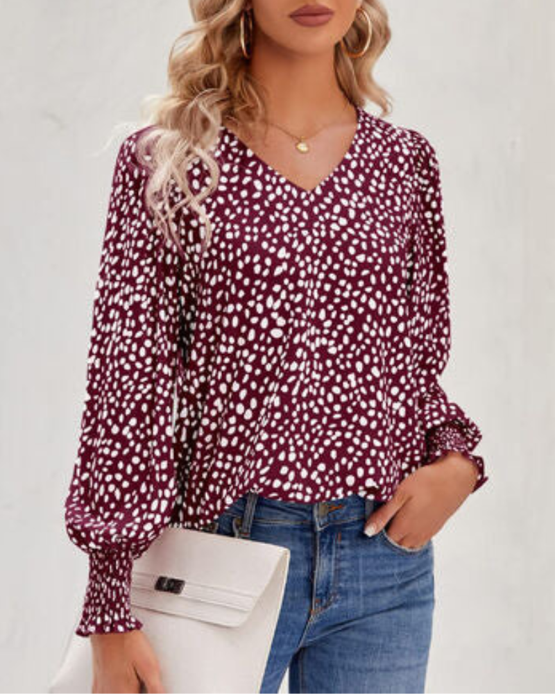 Radoslava-  Elegante gemusterte Bluse mit V-Ausschnitt und Puffärmeln Rot