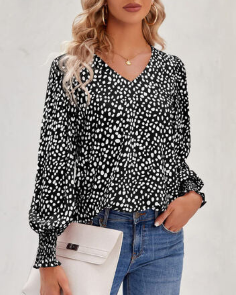 Radoslava-  Elegante gemusterte Bluse mit V-Ausschnitt und Puffärmeln Schwarz
