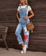 Kasandra - Geblümter Denim-Jumpsuit mit Bindegürtel